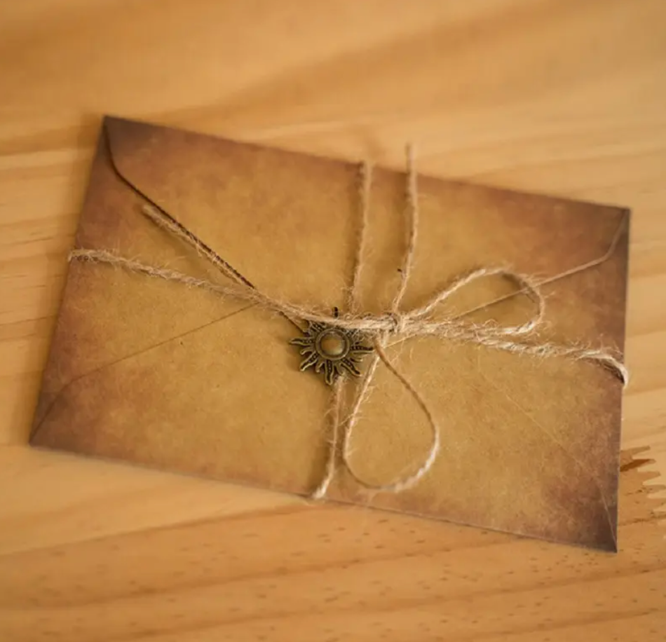 Vintage Kraft Envelopes with Letter Papers, pendants and Ropes